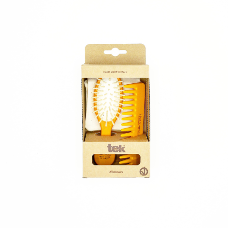 Purse kit: oval orange brush and comb with cotton pouch